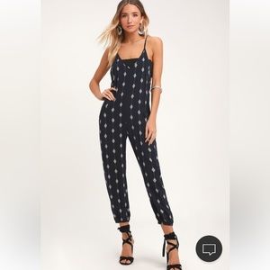 Lulu’s Embarcadero navy blue print jumpsuit, size small.